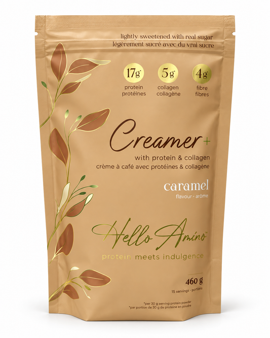 A 460g stand-up pouch of Hello Amino Creamer+ with protein and collagen, in caramel flavor. The packaging is a warm tan color with gold leaf illustrations and black and gold text.