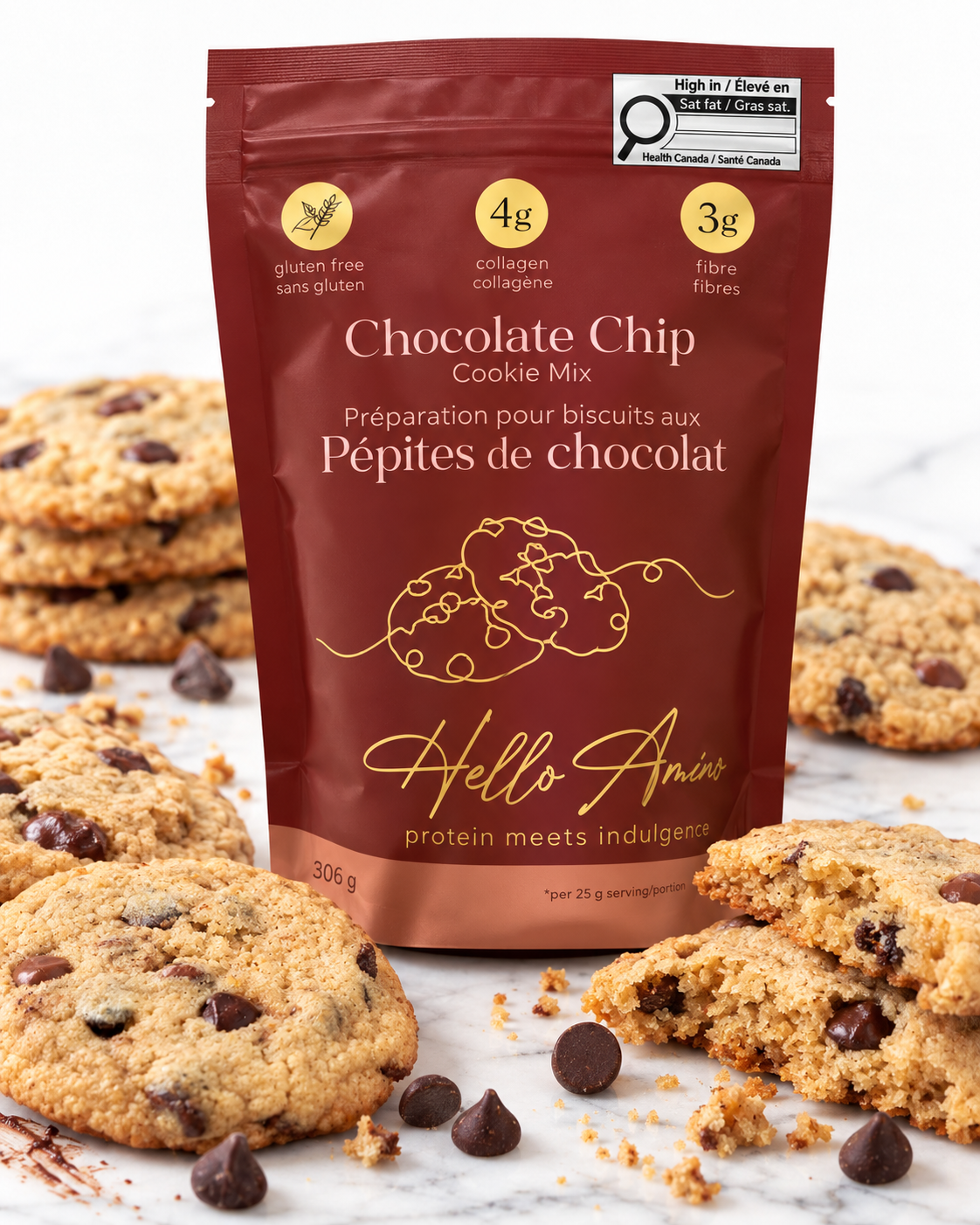 A stand-up pouch of Hello Annie Chocolate Chip Cookie Mix surrounded by chocolate chip cookies on a light marble surface. The pouch is dark reddish brown with gold text and graphics, and the package shows 306g of cookie mix.