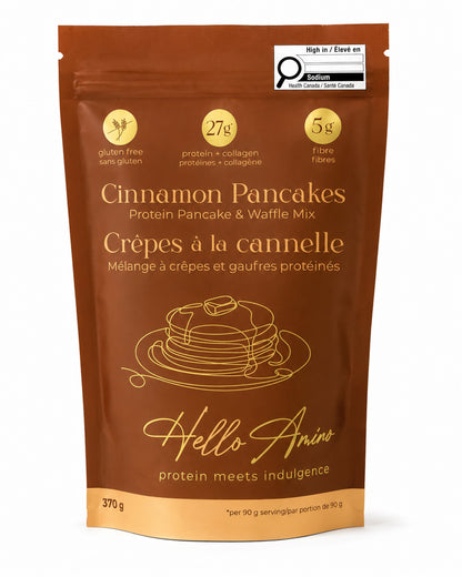 A 370 g stand-up pouch of Hello! Amino Cinnamon Pancakes (Protein Pancake & Waffle Mix) on a white background. The packaging is brown with gold text and graphics, featuring a stack of pancakes and a Hello! Amino logo.